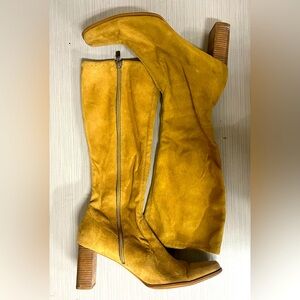 Knee high heeled boots